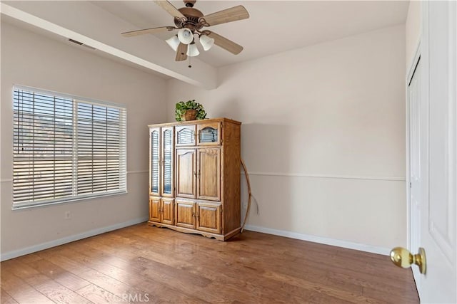 21509 Stage Dr, Tehachapi, CA 93561 - unfurnished bedroom featuring light wood-type flooring and ceiling fan