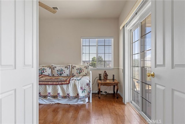 21509 Stage Dr, Tehachapi, CA 93561 - bedroom with wood finished floors and access to exterior
