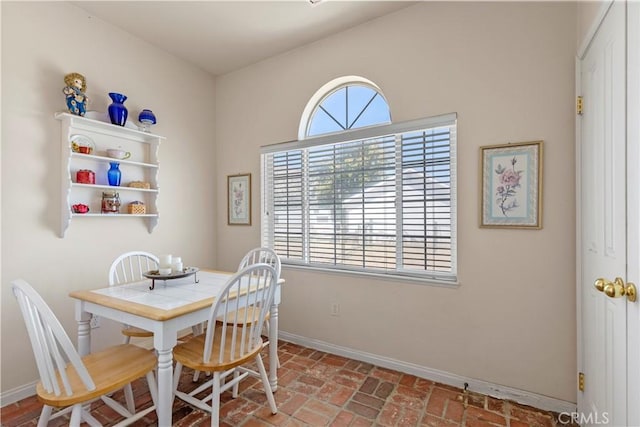 21509 Stage Dr, Tehachapi, CA 93561 - dining area featuring brick flooring and baseboards