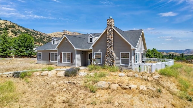 21509 Stage Dr, Tehachapi, CA 93561 - view of front of house with a mountain view and a chimney