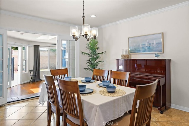 5066 N Nearglen Ave, Covina, CA 91724 - dining space featuring a chandelier, crown molding, light tile patterned flooring, and recessed lighting