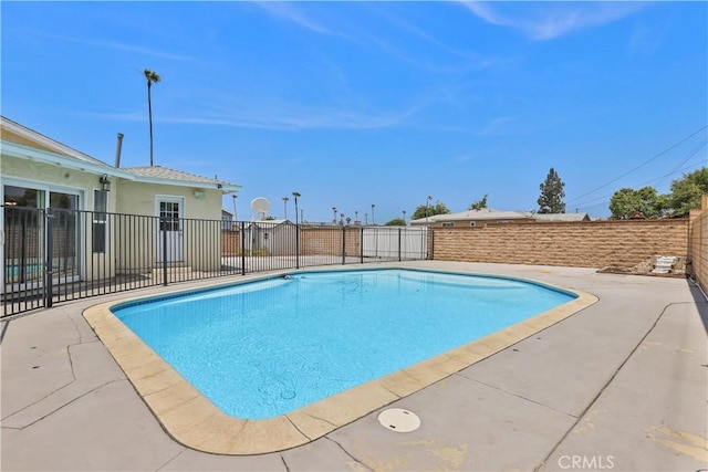 5066 N Nearglen Ave, Covina, CA 91724 - view of swimming pool featuring a fenced backyard and a patio