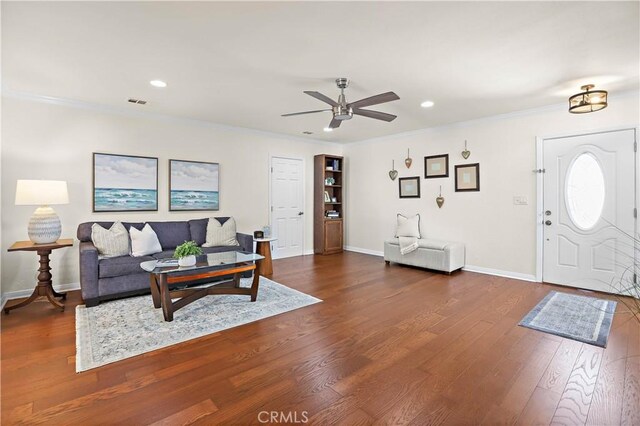 5066 N Nearglen Ave, Covina, CA 91724 - living room featuring a ceiling fan, ornamental molding, dark wood-style flooring, and recessed lighting