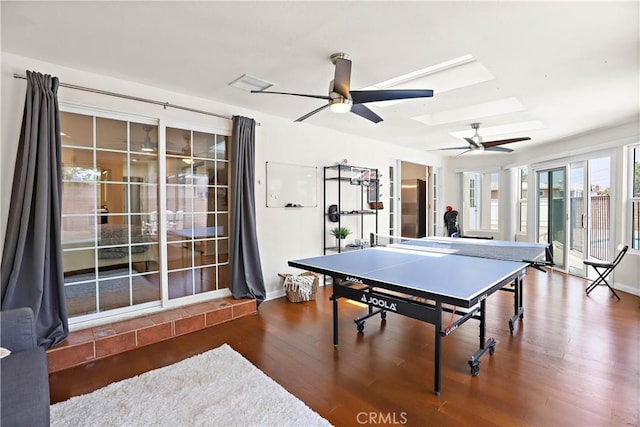 5066 N Nearglen Ave, Covina, CA 91724 - recreation room featuring ceiling fan, wood finished floors, and a skylight