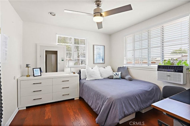 5066 N Nearglen Ave, Covina, CA 91724 - bedroom with multiple windows, dark wood-style floors, and a ceiling fan