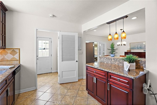 5066 N Nearglen Ave, Covina, CA 91724 - kitchen with reddish brown cabinets, pendant lighting, decorative backsplash, dishwasher, and light tile patterned floors