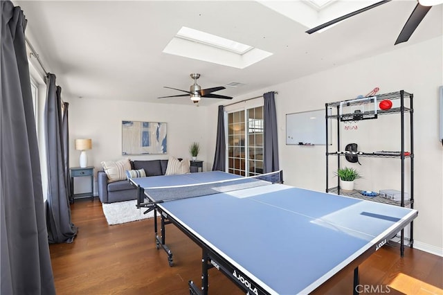 5066 N Nearglen Ave, Covina, CA 91724 - playroom featuring a ceiling fan, a skylight, and dark wood-style floors