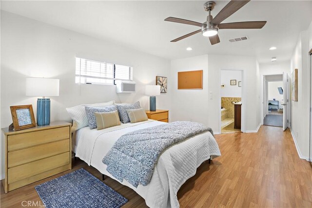 5066 N Nearglen Ave, Covina, CA 91724 - bedroom with recessed lighting, light wood-style flooring, ensuite bath, and a ceiling fan