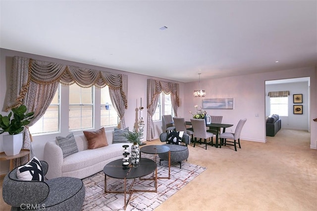 15681 Canon Ln, Chino Hills, CA 91709 - living area featuring healthy amount of natural light, light colored carpet, and a chandelier