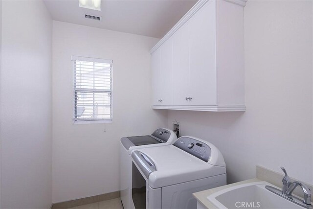15681 Canon Ln, Chino Hills, CA 91709 - washroom featuring independent washer and dryer and cabinet space