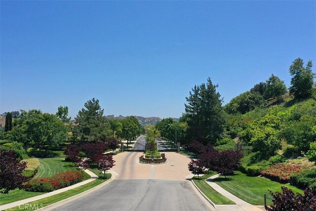 15681 Canon Ln, Chino Hills, CA 91709 - view of asphalt road with curbs and sidewalks