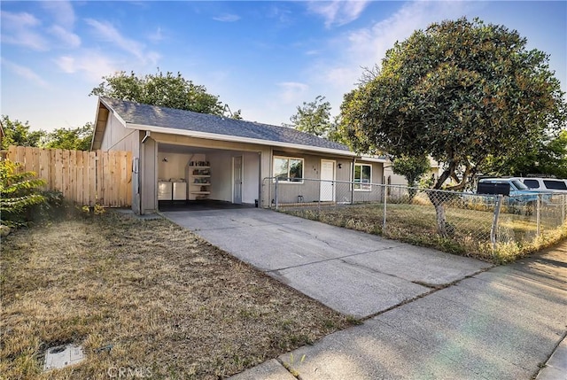 342 Rio Vista Ct, Corning, CA 96021 - ranch-style house featuring an attached carport, concrete driveway, and a fenced front yard