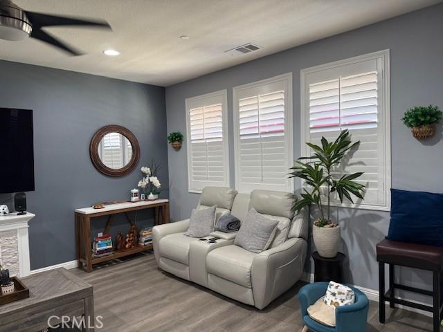 16001 Chase Rd Unit 111, Fontana, CA 92336 - living area with wood finished floors, recessed lighting, and ceiling fan