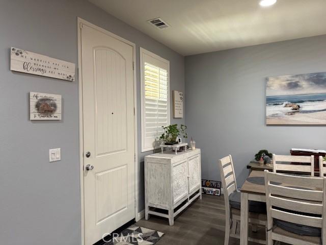 16001 Chase Rd Unit 111, Fontana, CA 92336 - dining room with dark wood finished floors and recessed lighting