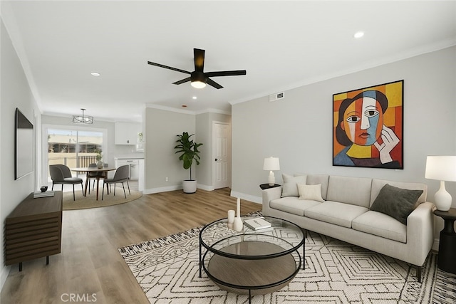1717 Norval St, Pomona, CA 91766 - living room with light wood-style flooring, recessed lighting, ceiling fan, and ornamental molding