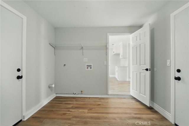 1717 Norval St, Pomona, CA 91766 - laundry room featuring gas dryer hookup, hookup for a washing machine, and wood finished floors