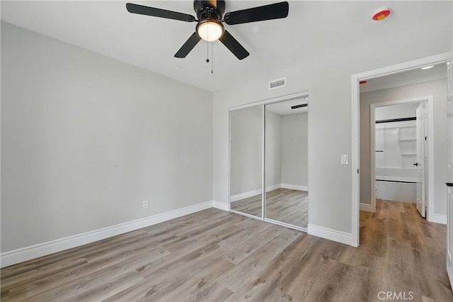 1717 Norval St, Pomona, CA 91766 - unfurnished bedroom with wood finished floors, a closet, and a ceiling fan