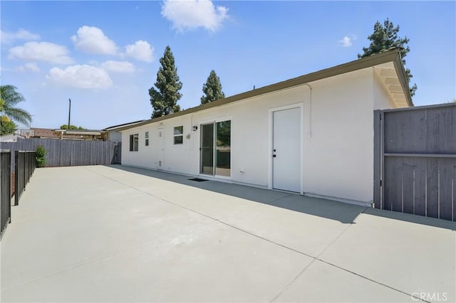 1717 Norval St, Pomona, CA 91766 - back of house featuring stucco siding and a patio