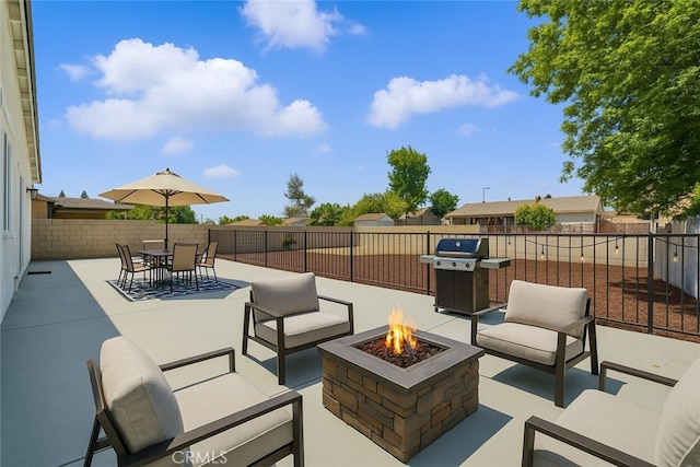 1717 Norval St, Pomona, CA 91766 - fenced backyard featuring grilling area, a patio, and an outdoor living space with a fire pit