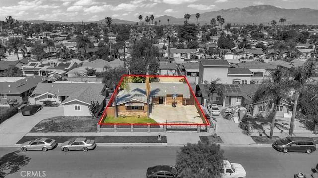 1109 Broadmoor Ave, La Puente, CA 91744 - aerial view of residential area with a mountain backdrop and property boundaries highlighted