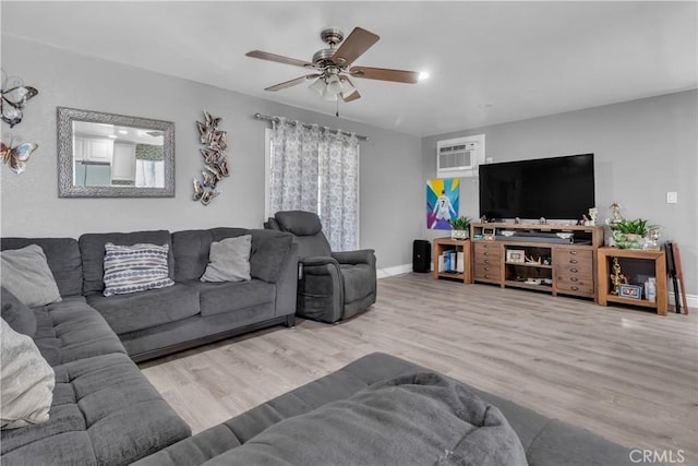 1109 Broadmoor Ave, La Puente, CA 91744 - living room featuring a wall mounted air conditioner, ceiling fan, wood finished floors, and healthy amount of natural light