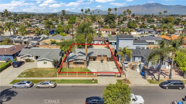 1109 Broadmoor Ave, La Puente, CA 91744 - aerial perspective of suburban area featuring property boundaries highlighted and a mountainous background