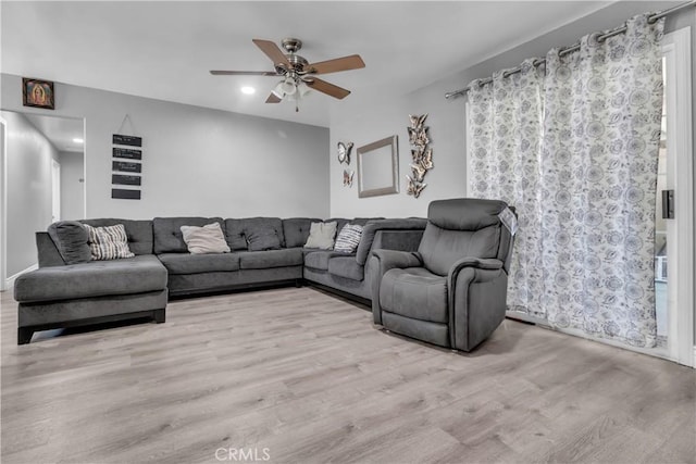 1109 Broadmoor Ave, La Puente, CA 91744 - living area with ceiling fan and wood finished floors