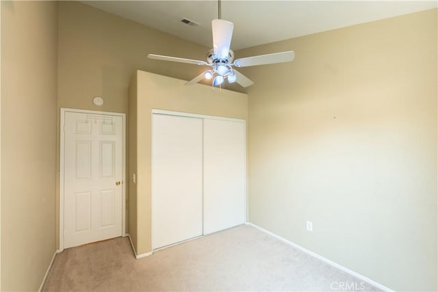 6419 Panorama Ct, Rancho Cucamonga, CA 91737 - unfurnished bedroom with light colored carpet, a closet, and a ceiling fan