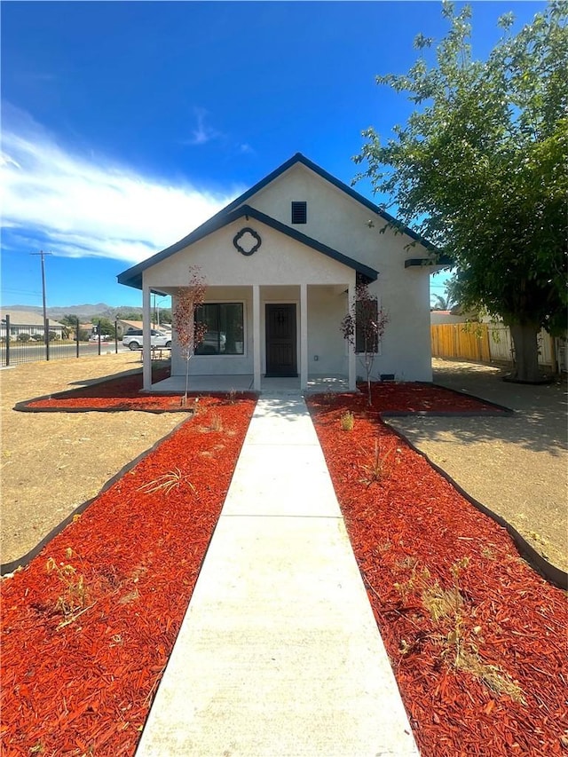 1295 E Whittier Ave, Hemet, CA 92543 - view of front facade with stucco siding and a porch