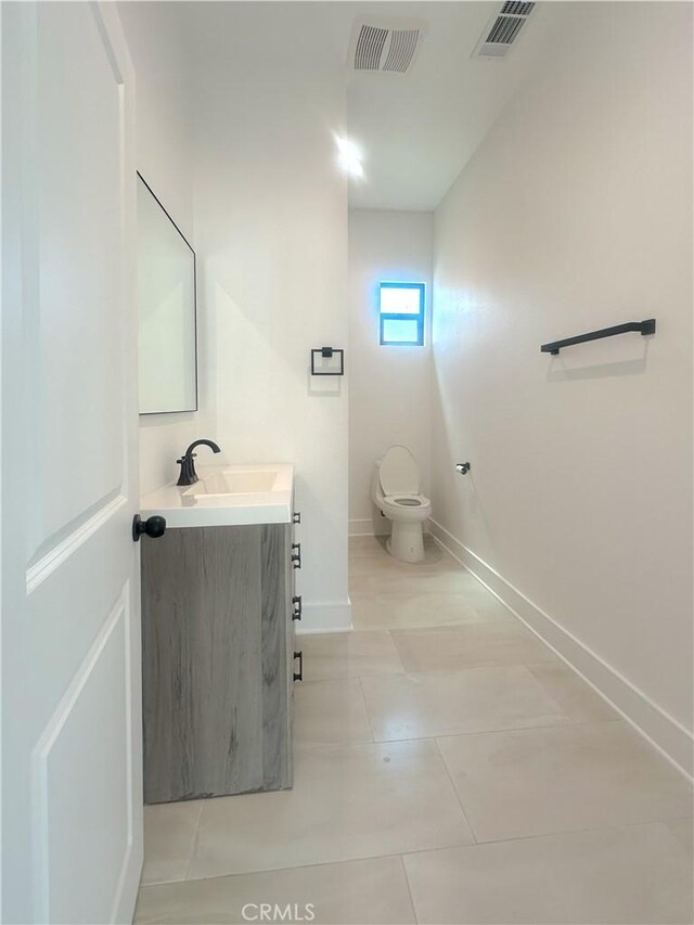 1295 E Whittier Ave, Hemet, CA 92543 - bathroom with vanity and toilet