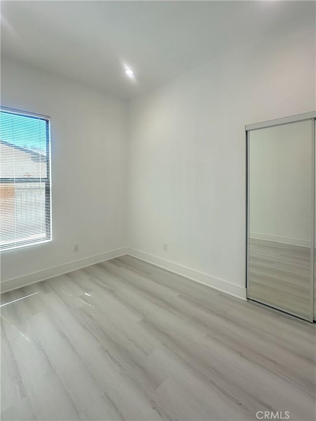 1295 E Whittier Ave, Hemet, CA 92543 - spare room featuring light wood-style flooring and recessed lighting