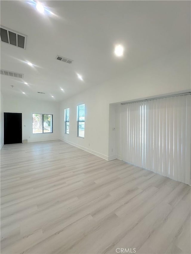 1295 E Whittier Ave, Hemet, CA 92543 - empty room with light wood-style flooring and baseboards