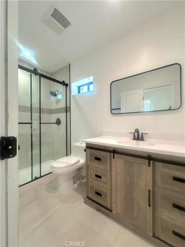 1295 E Whittier Ave, Hemet, CA 92543 - full bathroom featuring vanity, a stall shower, and tile patterned flooring