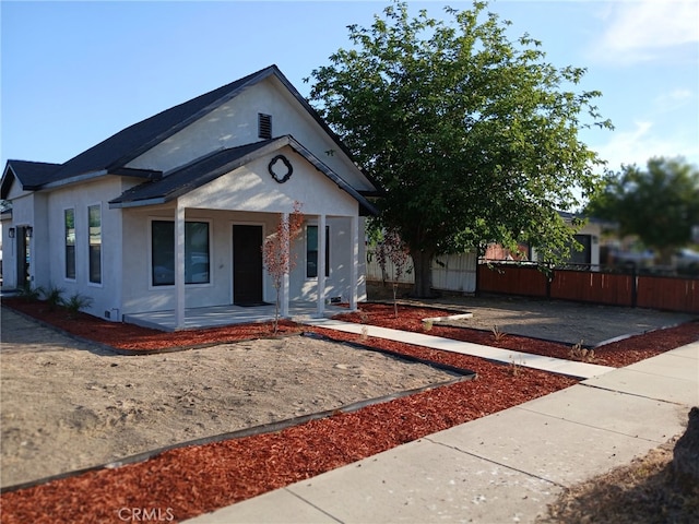 1295 E Whittier Ave, Hemet, CA 92543 - view of front of house with covered porch and stucco siding