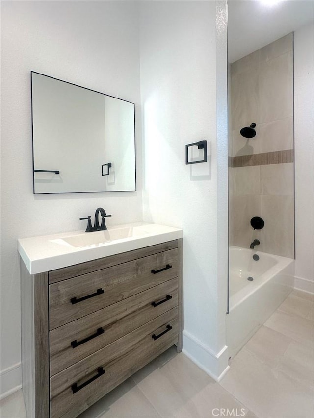 1295 E Whittier Ave, Hemet, CA 92543 - full bath with vanity, shower / tub combination, and marble look tiles