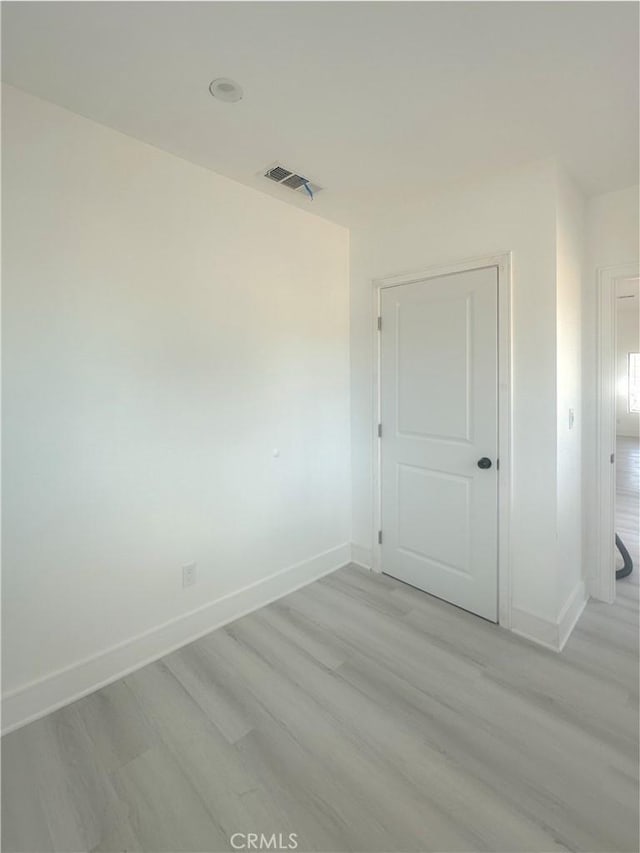 1295 E Whittier Ave, Hemet, CA 92543 - spare room featuring light wood-style flooring and baseboards