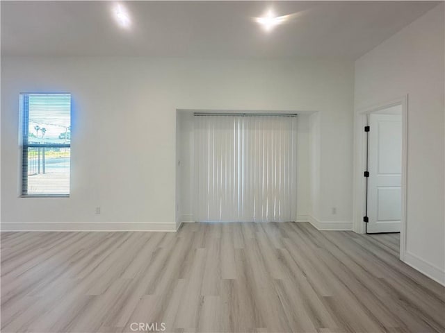 1295 E Whittier Ave, Hemet, CA 92543 - unfurnished room with light wood-style flooring and baseboards