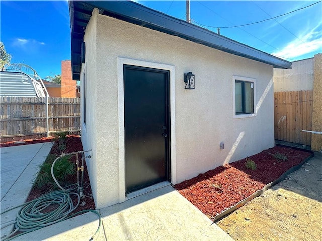 1295 E Whittier Ave, Hemet, CA 92543 - property entrance featuring stucco siding