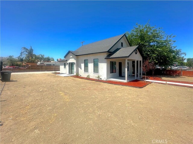 1295 E Whittier Ave, Hemet, CA 92543 - back of property featuring a patio and stucco siding