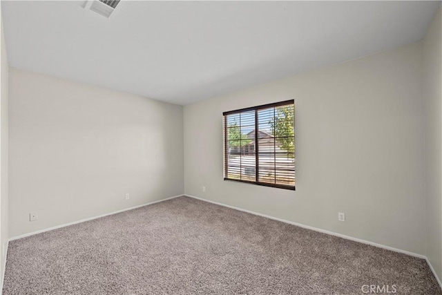 6327 W W Ave J5, Lancaster, CA 93536 - spare room featuring carpet flooring and baseboards