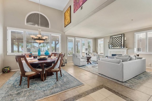 42 Paseo Alba, San Clemente, CA 92672 - tiled dining area with a chandelier and a fireplace