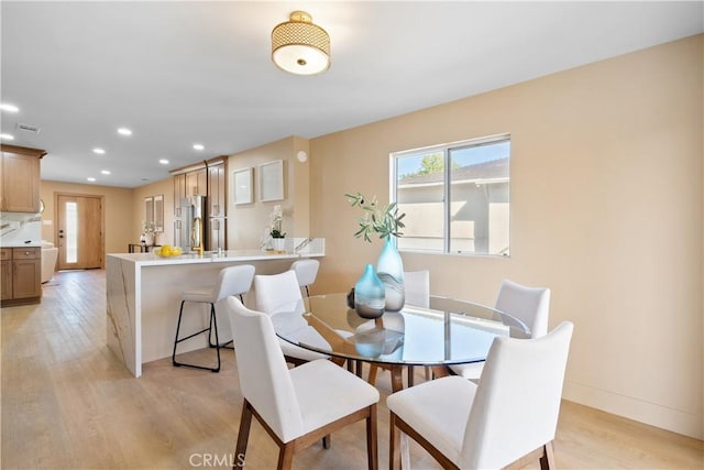 3273 Tilden Ave, Los Angeles, CA 90034 - dining area featuring light wood-style floors and recessed lighting