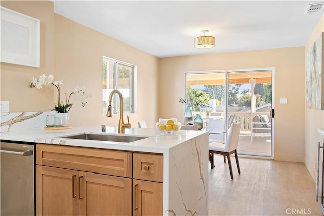 3273 Tilden Ave, Los Angeles, CA 90034 - kitchen featuring light wood-type flooring and stainless steel dishwasher