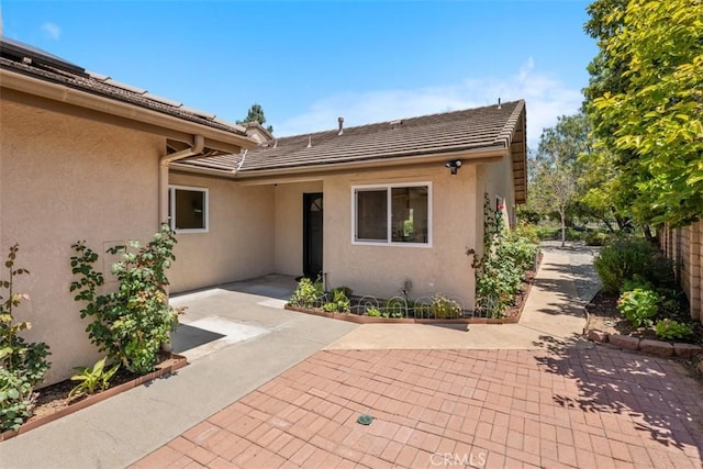 4346 Los Padres Dr, Fallbrook, CA 92028 - property entrance featuring stucco siding, a patio, and a tile roof