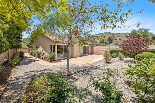 4346 Los Padres Dr, Fallbrook, CA 92028 - back of property featuring stucco siding, a fenced backyard, a patio area, and a mountain view