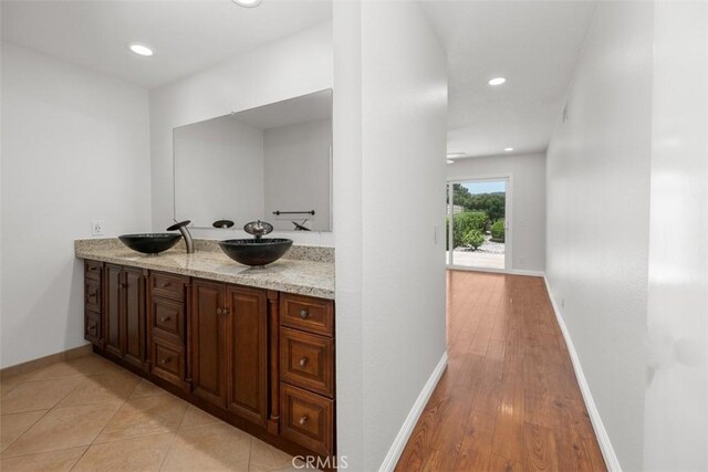 4346 Los Padres Dr, Fallbrook, CA 92028 - bathroom with double vanity, recessed lighting, and wood finished floors