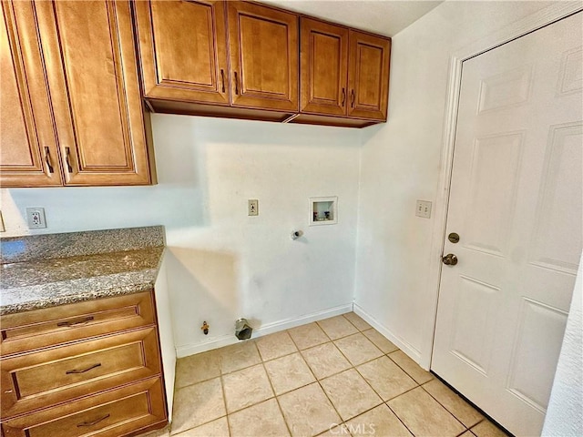 4727 Wilson St, Chino, CA 91710 - laundry area featuring hookup for a gas dryer, washer hookup, cabinet space, electric dryer hookup, and light tile patterned floors