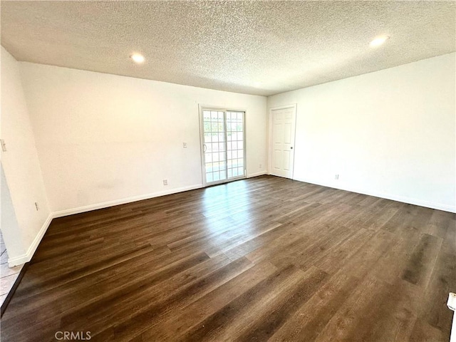 4727 Wilson St, Chino, CA 91710 - unfurnished room with dark wood-type flooring, a textured ceiling, and recessed lighting