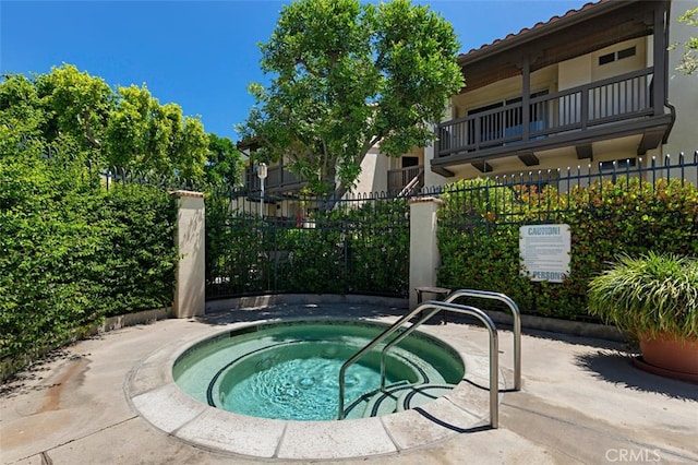 8718 E Indian Hills Rd Unit J, Orange, CA 92869 - view of swimming pool featuring a community hot tub