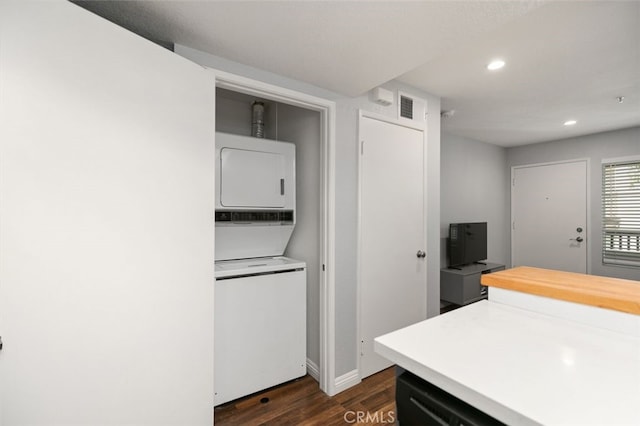 8718 E Indian Hills Rd Unit J, Orange, CA 92869 - washroom featuring stacked washer / dryer, dark wood finished floors, and recessed lighting